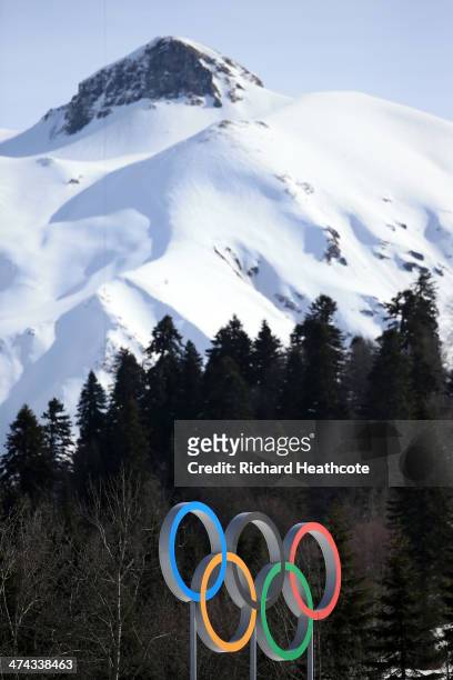 The Olympic rings are seen in front of a mountain during the Men's 50 km Mass Start Free during day 16 of the Sochi 2014 Winter Olympics at Laura...