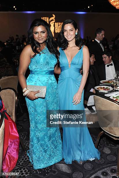 Actresses Mindy Kaling and Olivia Munn attend the 16th Costume Designers Guild Awards with presenting sponsor Lacoste at The Beverly Hilton Hotel on...