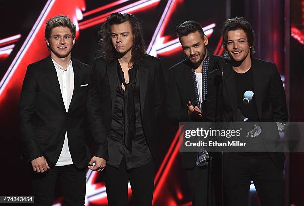 Recording artists Niall Horan, Harry Styles, Liam Payne and Louis Tomlinson of One Direction present an award during the 2015 Billboard Music Awards...