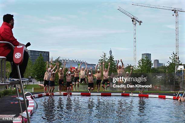 Members of the East German Ladies' swimming team jump in the new 'King's Cross Pond Club' outdoor swimming pool on May 22, 2015 in London, England....