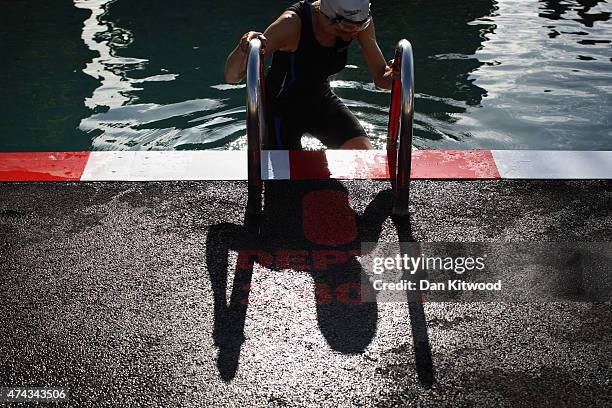 Member of the East German Ladies' swimming team enters the new 'King's Cross Pond Club' outdoor swimming pool on May 22, 2015 in London, England. The...
