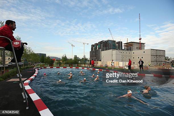 Members of the East German Ladies' swimming team swim in the new 'King's Cross Pond Club' outdoor swimming pool on May 22, 2015 in London, England....