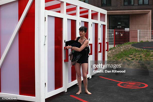 Member of the public arrives to swim at the new 'King's Cross Pond Club' outdoor swimming pool on May 22, 2015 in London, England. The 40 metre pool...