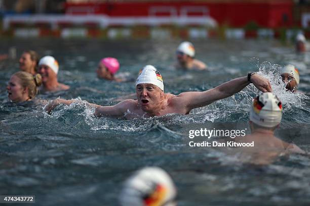 Members of the East German Ladies' swimming team swim in the new 'King's Cross Pond Club' outdoor swimming pool on May 22, 2015 in London, England....