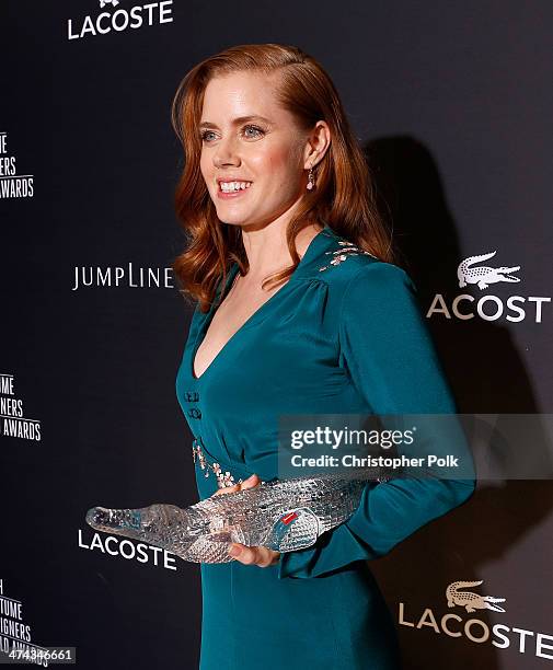 Spotlight Award Honoree Amy Adams attends the 16th Costume Designers Guild Awards with presenting sponsor Lacoste at The Beverly Hilton Hotel on...