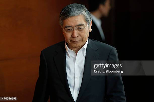 Haruhiko Kuroda, governor of the Bank of Japan , arrives for a news conference at the central bank's headquarters in Tokyo, Japan, on Friday, May 22,...
