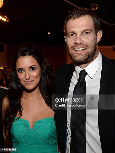 Actors Angelique Cabral and Geoff Stults attend the 16th Costume Designers Guild Awards with presenting sponsor Lacoste at The Beverly Hilton Hotel...