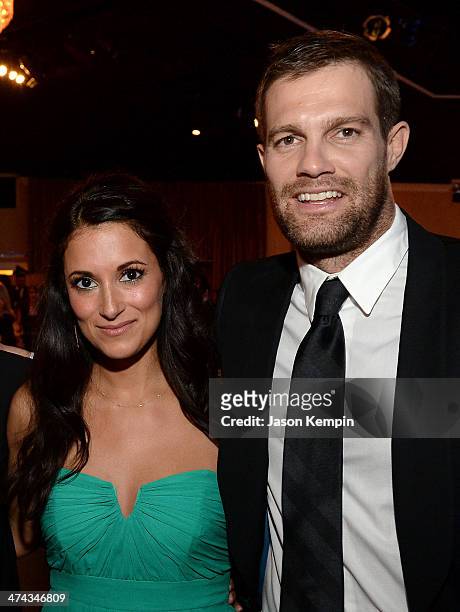 Actors Angelique Cabral and Geoff Stults attend the 16th Costume Designers Guild Awards with presenting sponsor Lacoste at The Beverly Hilton Hotel...