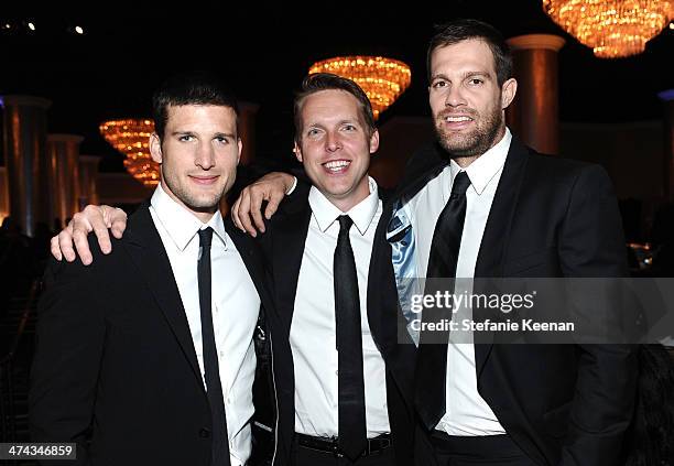 Actor Parker Young, writer/producer Kevin Biegel and actor Geoff Stults attend the 16th Costume Designers Guild Awards with presenting sponsor...