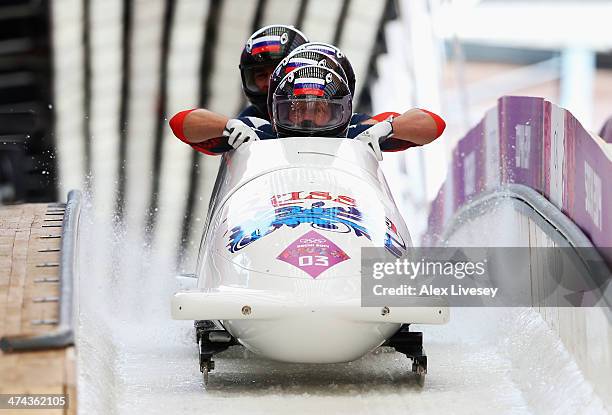 Pilot Alexander Zubkov, Alexey Negodaylo, Dmitry Trunenkov and Alexey Voevoda of Russia team 1 finish a run during the Men's Four-Man Bobsleigh on...