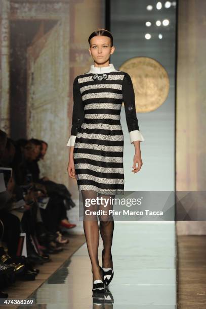 Model walks the runway during the Roccobarocco show as part of Milan Fashion Week Womenswear Autumn/Winter 2014 on February 23, 2014 in Milan, Italy.