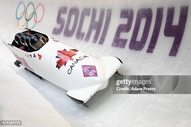 Pilot Lyndon Rush, Lascelles Brown, David Bissett and Neville Wright of Canada team 2 make a run during the Men's Four-Man Bobsleigh on Day 16 of the...