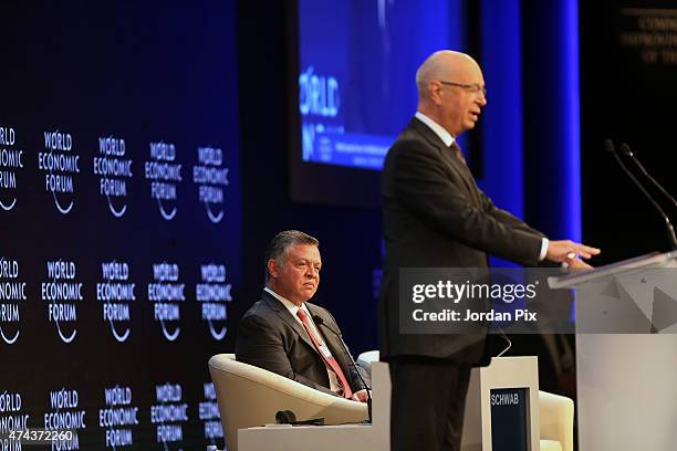 Klaus Schwab , Founder and Executive Chairman, World Economic Forum, welcomes Jordan's King Abdullah II Ibn Al Hussein at the opening of the World...