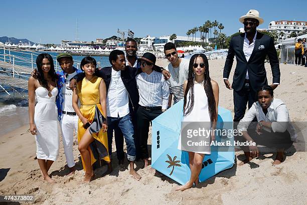 Zoe Kravitz in front of Chanel Iman, executive producer Pharrell Williams, Shameik Moore, Shameik Moore, Amin Joseph, Tony Revolori, director Rick...