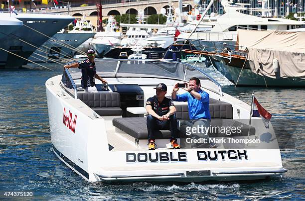 Max Verstappen of Netherlands and Scuderia Toro Rosso and his father Jos Verstappen are seen on a boat in the harbour during previews to the Monaco...