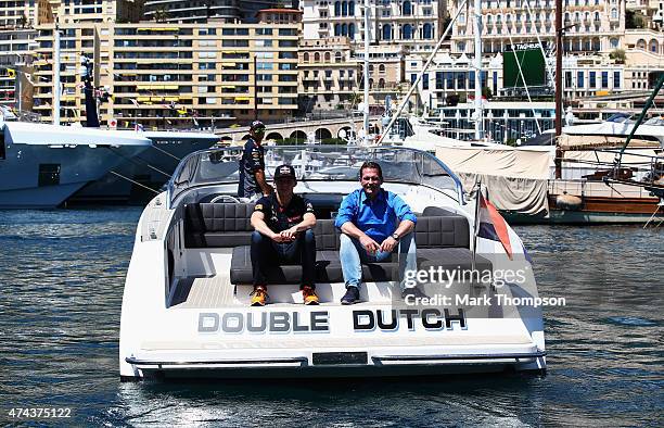 Max Verstappen of Netherlands and Scuderia Toro Rosso and his father Jos Verstappen are seen on a boat in the harbour during previews to the Monaco...