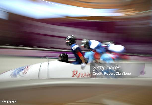 Alexander Zubkov, Alexey Negodaylo, Dmitry Trunenkov and Alexey Voevoda of Russia team 1 make a final run during the Men's Four Man Bobsleigh on day...