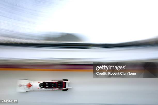 Lyndon Rush, Lascelles Brown, David Bissett and Neville Wright of Canada team 2 make a final run during the Men's Four Man Bobsleigh on day 16 of the...