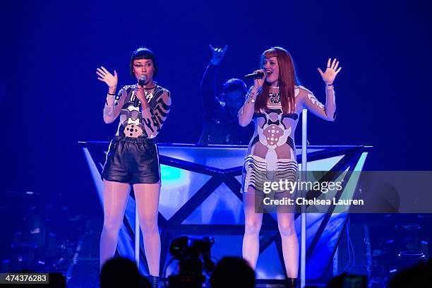 Singers Aino Jawo and Caroline Hjelt of Icona Pop perform during the "Bangerz Tour" at Staples Center on February 22, 2014 in Los Angeles, California.