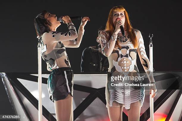 Singers Aino Jawo and Caroline Hjelt of Icona Pop perform during the "Bangerz Tour" at Staples Center on February 22, 2014 in Los Angeles, California.