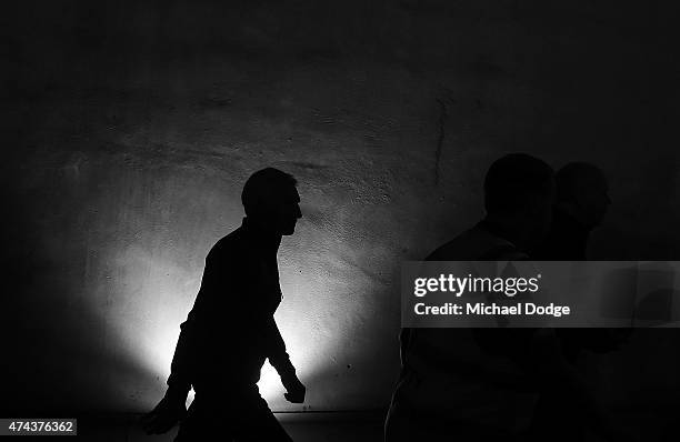 Blues head coach Michael Malthouse walks out during the round eight AFL match between the Geelong Cats and the Carlton Blues at Etihad Stadium on May...