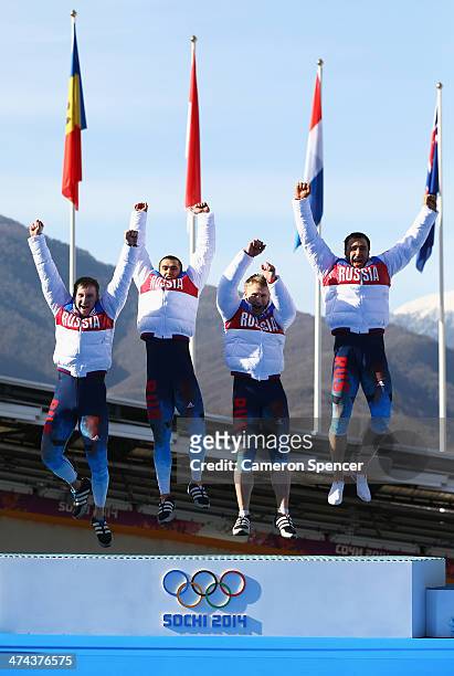 Gold medalist Russia team 1 celebrates on the podium during the medal ceremony for the Four-Man Bobsleigh on Day 16 of the Sochi 2014 Winter Olympics...