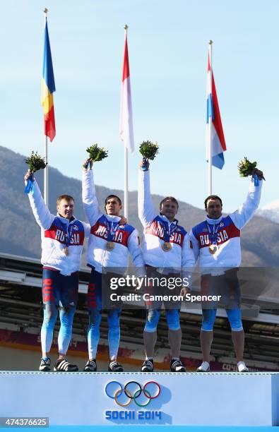 Gold medalists Russia team 1 celebrate on the podium during the medal ceremony for the Four-Man Bobsleigh on Day 16 of the Sochi 2014 Winter Olympics...