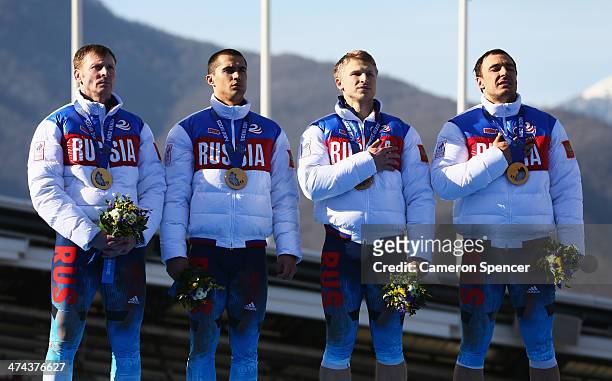 Gold medalists Russia team 1 celebrate on the podium during the medal ceremony for the Four-Man Bobsleigh on Day 16 of the Sochi 2014 Winter Olympics...