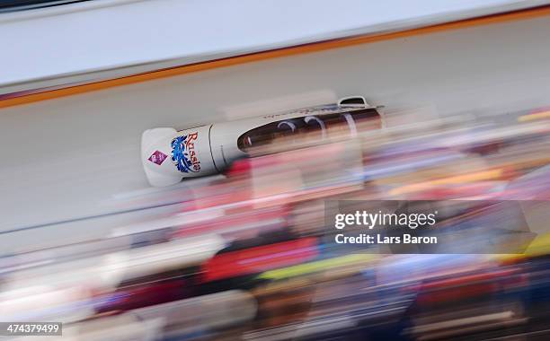 Pilot Alexander Kasjanov, Ilvir Huzin, Maxim Belugin and Aleksei Pushkarev of Russia team 2 make a run during the Men's Four Man Bobsleigh on day 16...