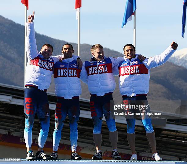 Gold medalists Russia team 1 celebrate on the podium during the medal ceremony for the Four-Man Bobsleigh on Day 16 of the Sochi 2014 Winter Olympics...