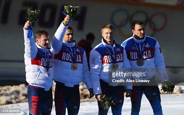 Gold medalists Russia team 1 celebrate during the medal ceremony for the Four-Man Bobsleigh on Day 16 of the Sochi 2014 Winter Olympics at Sliding...
