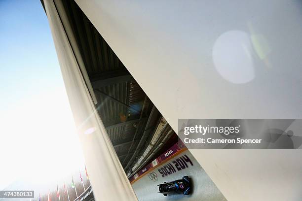Pilot Francesco Friedrich, Jannis Baecker, Gregor Bermbach and Thorsten Margis of Germany team 2 make a run during the Men's Four Man Bobsleigh on...