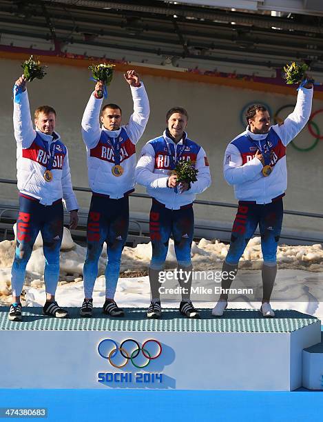 Gold medalists Russia team 1 celebrate on the podium during the medal ceremony for the Four-Man Bobsleigh on Day 16 of the Sochi 2014 Winter Olympics...
