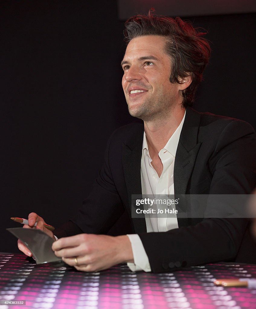 Brandon Flowers Signs Copies Of His New Album 'The Desired Effect'