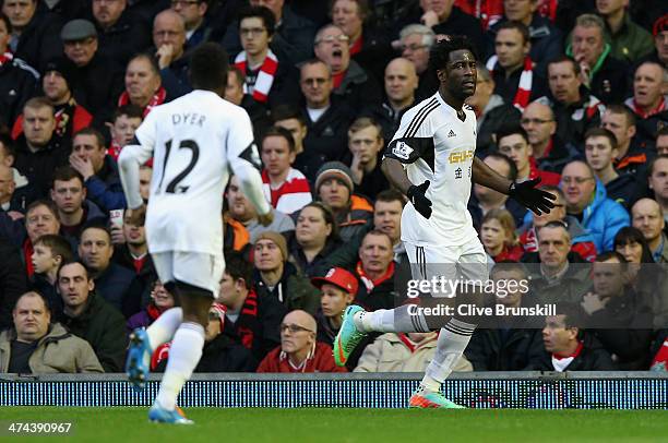 Wilfried Bony of Swansea City celebrates scoring his team's second goal during the Barclays Premier League match between Liverpool and Swansea City...