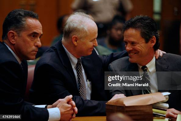 David Raben Edward Locascio, center, celebrates with his attorneys David Raben ...