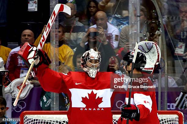 Carey Price and Dan Hamhuis of Canada celebrate after defeating Sweden 3-0 during the Men's Ice Hockey Gold Medal match on Day 16 of the 2014 Sochi...