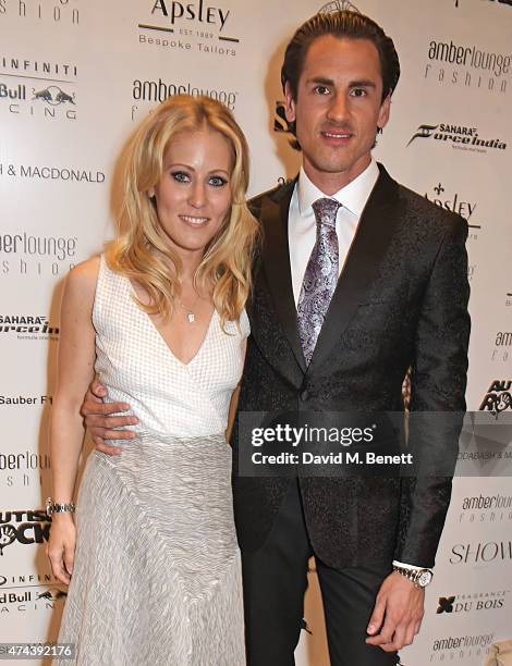 Jennifer Becks and Racing Driver Adrian Sutil attend the Amber Lounge 2015 Gala at Le Meridien Beach Plaza Hotel on May 22, 2015 in Monaco, Monaco.