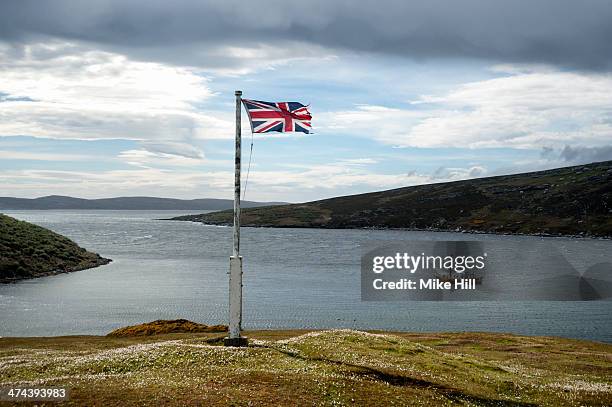 the union jack flag fluttering in the wind - falkland islands stock pictures, royalty-free photos & images