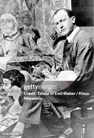 German-American artist George Grosz at work, circa 1930.