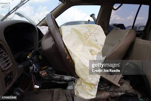Deployed airbag is seen in a Nissan vehicle at the LKQ Pick Your Part salvage yard on May 22, 2015 in Medley, Florida. The largest automotive recall...