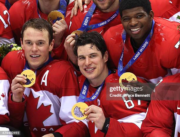 Jonathan Toews, Sidney Crosby and P.K. Subban of Canada pose with the gold medals won during the Men's Ice Hockey Gold Medal match against Sweden on...