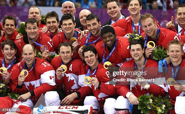 The Canada team pose with the gold medals won during the Men's Ice Hockey Gold Medal match against Sweden on Day 16 of the 2014 Sochi Winter Olympics...