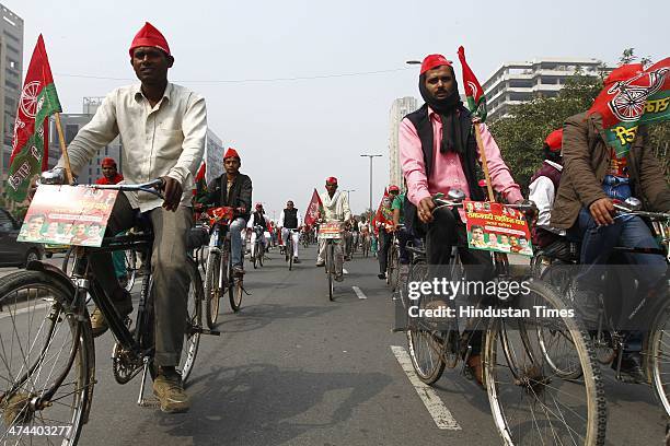 Samajwadi party workers participate in a cycle rally from New Delhi to Lucknow to woo voters for the upcoming Lok Sabha elections, at Jantar Mantar...