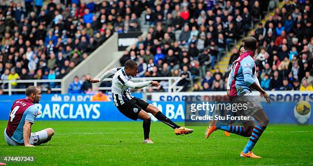 Newcastle player Loic Remy scores the winning goal during the Barclays Premier League match between Newcastle United and Aston Villa at St James'...