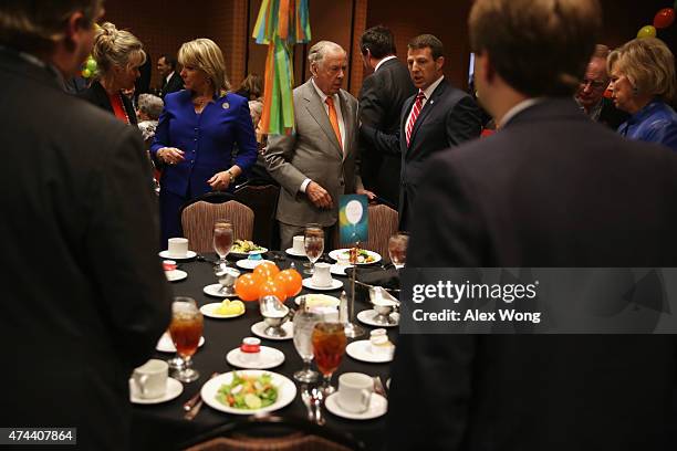 Founder and Chairman of BP Capital Management T. Boone Pickens and Oklahoma Governor Mary Fallin participate in a "birthday bash" to celebrate...