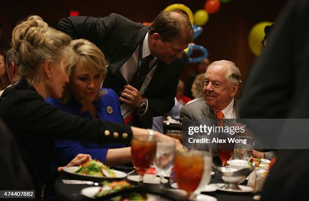 Founder and Chairman of BP Capital Management T. Boone Pickens and Oklahoma Governor Mary Fallin participate in a "birthday bash" to celebrate...