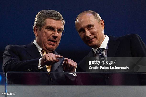 Thomas Bach , President of the IOC and Russian President Vladimir Putin attend the 2014 Sochi Winter Olympics Closing Ceremony at Fisht Olympic...