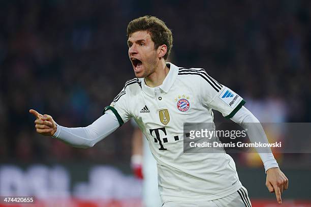 Thomas Mueller of FC Bayern Muenchen celebrates after scoring his team's first goal during the Bundesliga match between Hannover 96 and FC Bayern...