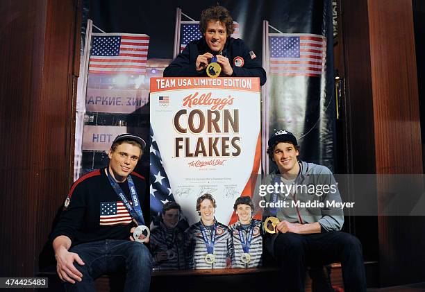 Gus Kenworthy, Joss Christensen and Nick Goepper pose with their medals and a cereal box with their photo on it during the U.S. Olympic Committee's...